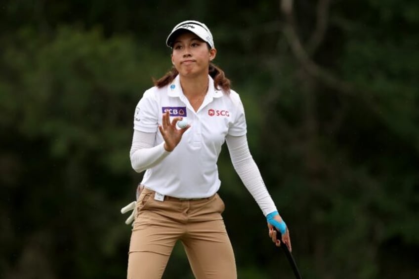 Thailand's Atthaya Thitikul reacts on the seventh green in the third round of the LPGA's C