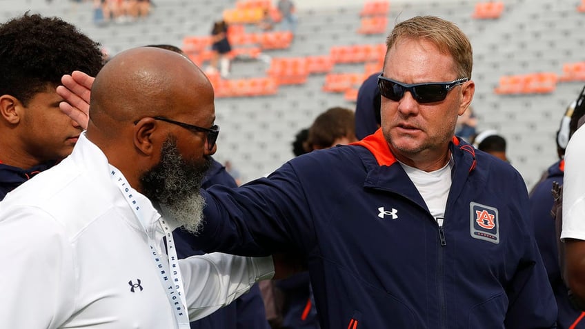 Hugh Freeze and Chette Williams