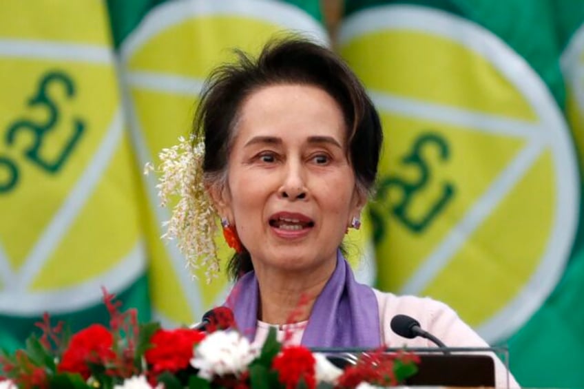 aung san suu kyi has some of her prison sentences reduced by myanmars military led government