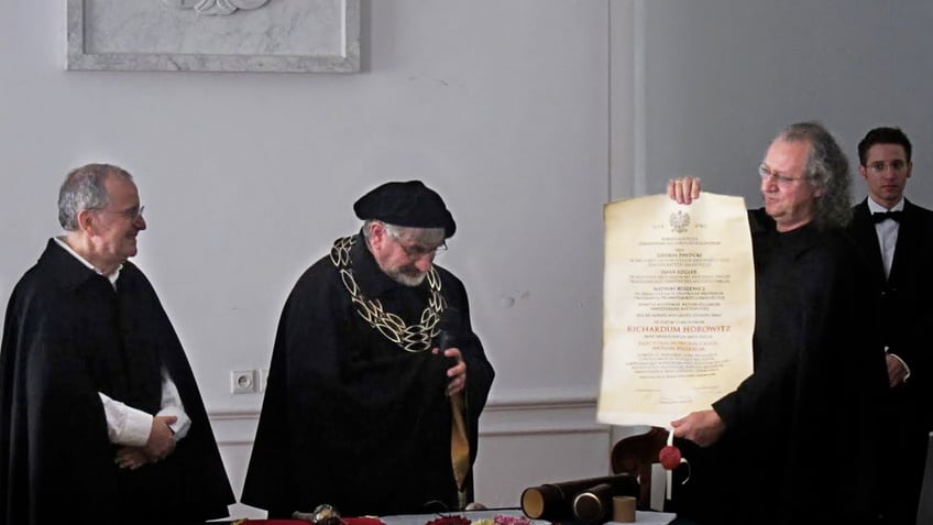 Ryszard Horowitz receives an honorary doctorate at the University of Warsaw, Poland. Photo courtesy Ryszard Horowitz.