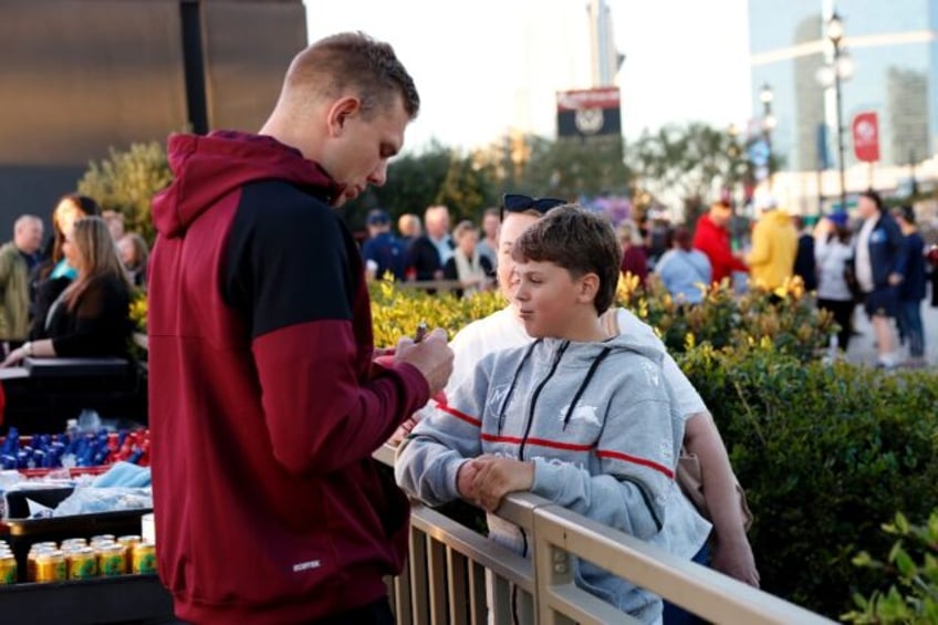 Tom Trbojevic of the NRL's Manly-Warringah Sea Eagles signs autographs for fans in Las Veg