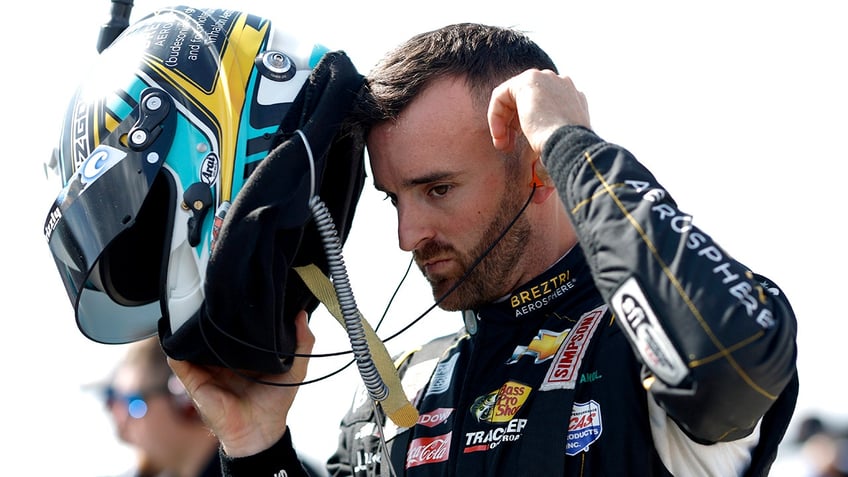 austin dillon chucks helmet at tyler reddick after crash at pocono