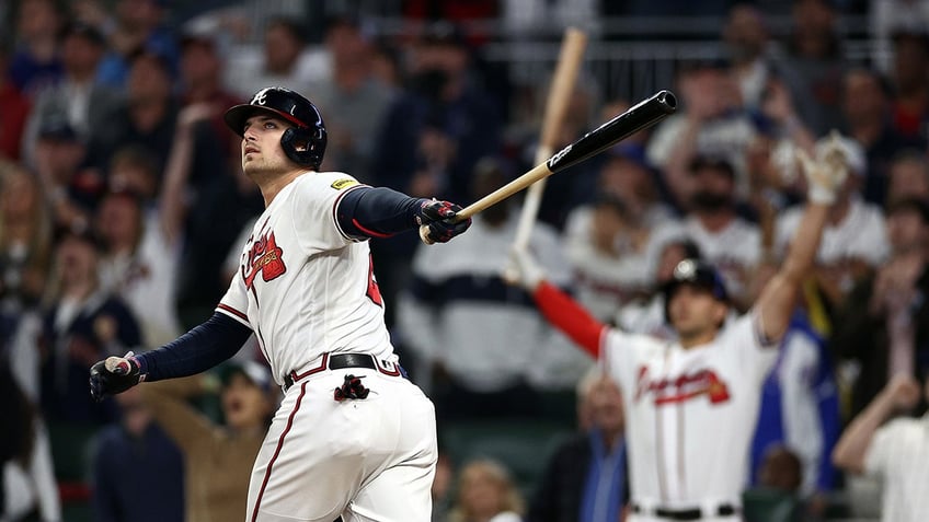 austin rileys clutch homer crazy game ending double play lifts braves over phillies ties nlds