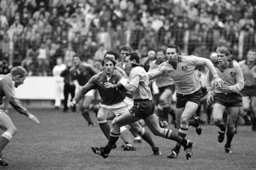 Schmidt U-Turn: Australia great David Campese (with the ball) in action for the Wallabies