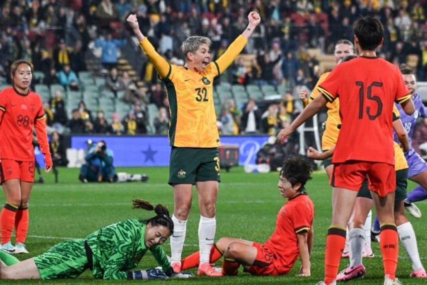 Australia's Michelle Heyman (C) celebrates after scoring against China