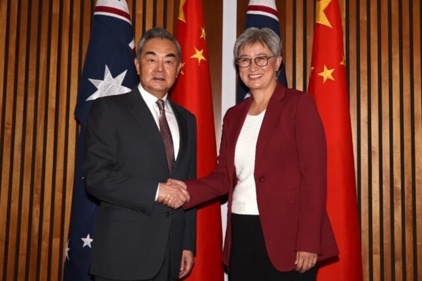 Australian Foreign Minister Penny Wong (R) met with Chinese Foreign Minister Wang Yi in Ca