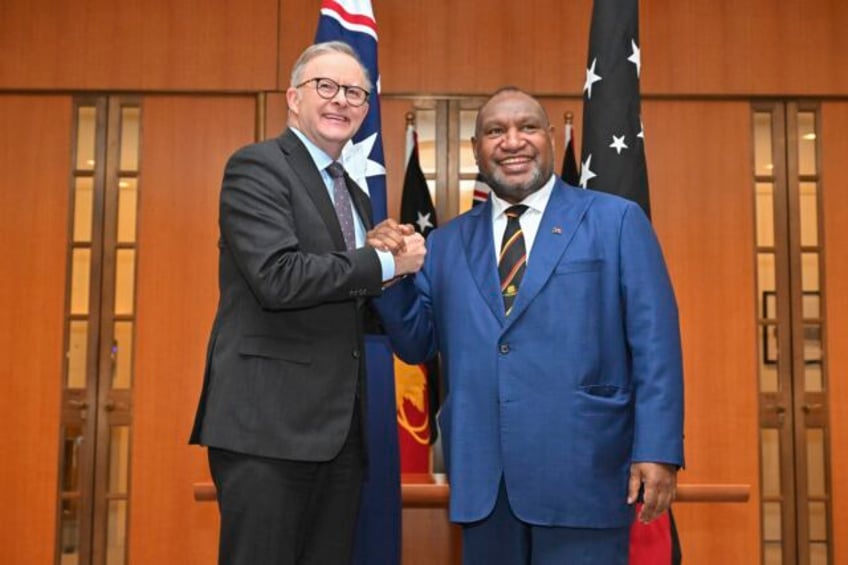 australia pushes against chinas pacific influence through a security pact with papua new guinea