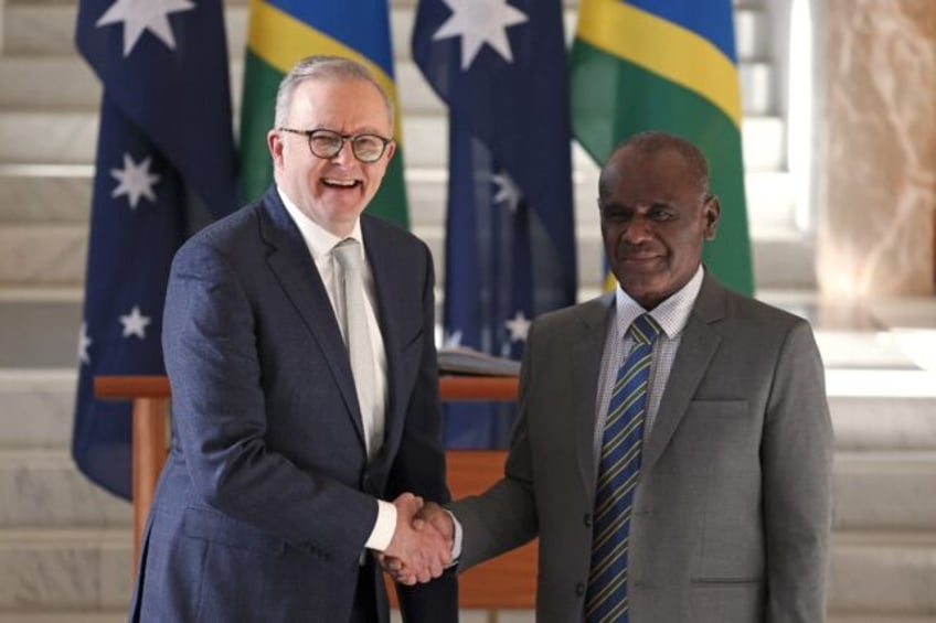 Australian Prime Minister Anthony Albanese (L, with Solomons Prime Minister Jeremiah Manel