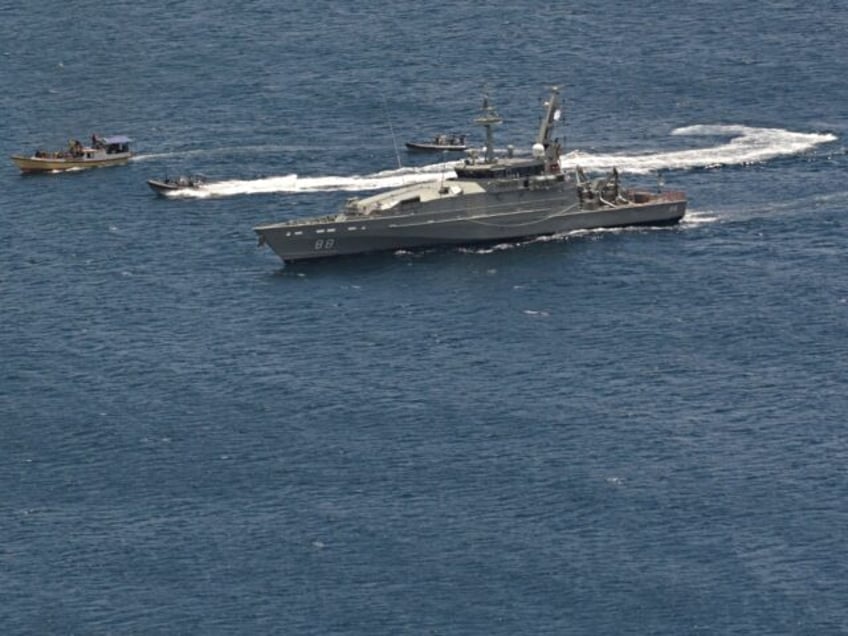 CHRISTMAS ISLAND - AUGUST 3: Suspected asylum seeker vessel arrives at Flying Fish Cove, C