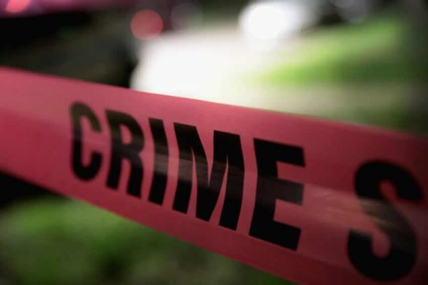 A Montana man has been sentenced to 18 years in prison for firing shots into the home of a lesbian woman