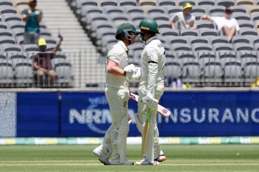 Usman Khawaja (R) wore a black armband on Thursday