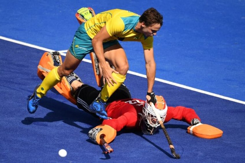 Midfielder Tom Craig (left) has been banned by Hockey Australia following his arrest last