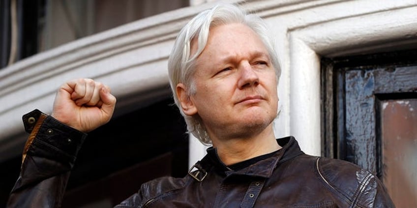 australian prime minister says government stands firm against us prosecution of julian assange