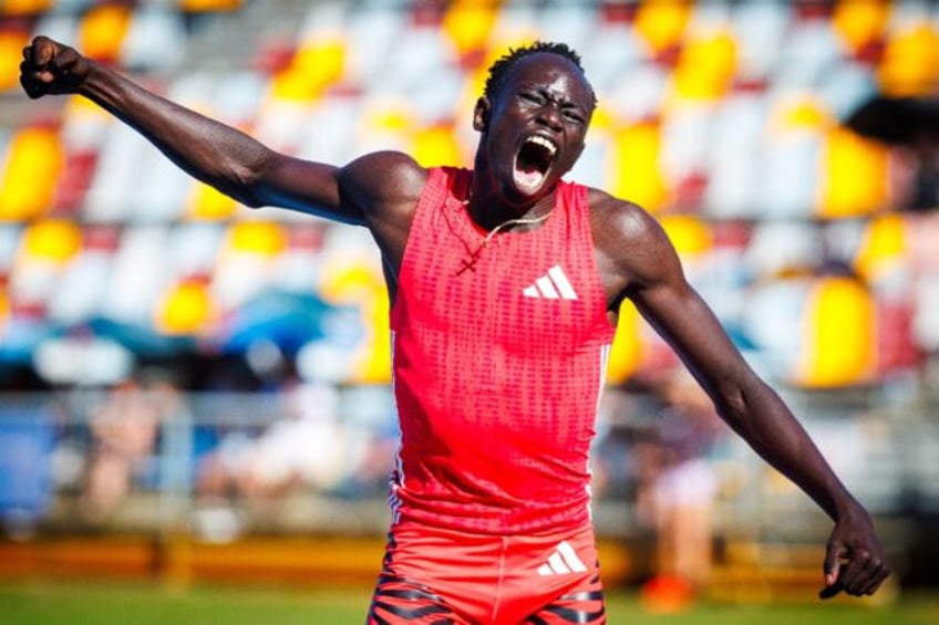 Australian schoolboy Gout Gout celebrates after running the fastest 200m in the world this