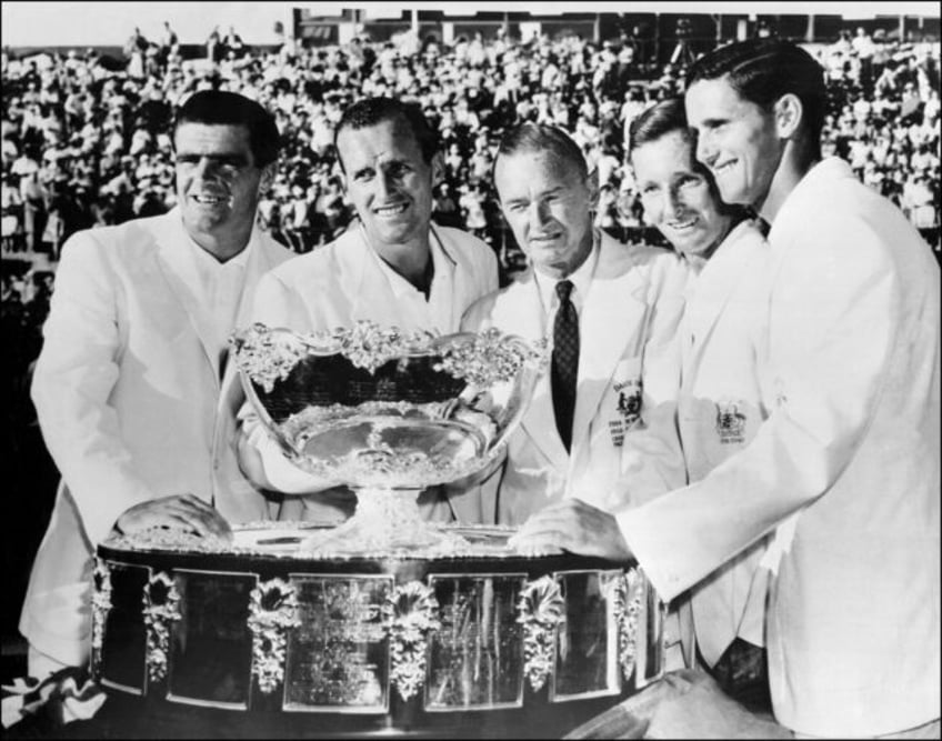 Neale Fraser (2nd left) with the Davis Cup trophy in 1961