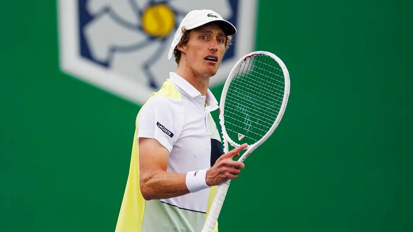 australian tennis star marc polmans disqualified after hitting ball in umpires face