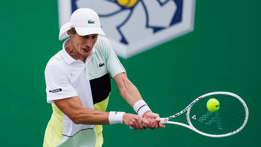 australian tennis star marc polmans disqualified after hitting ball in umpires face