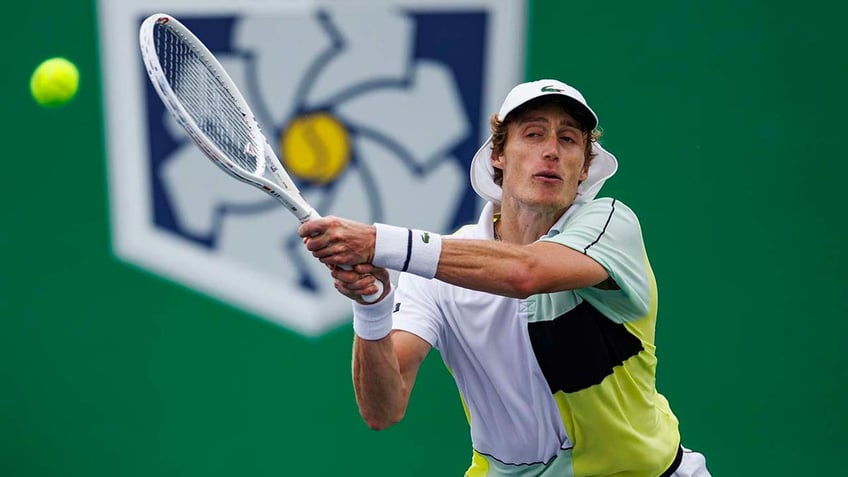 australian tennis star marc polmans disqualified after hitting ball in umpires face