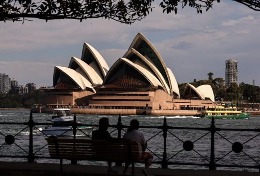 australians fete sydney opera houses 50th anniversary