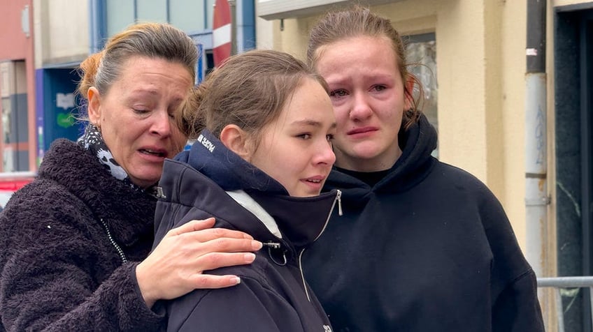 Austrian women crying after mass stabbing attack by Syrian national who declared allegiance to IS