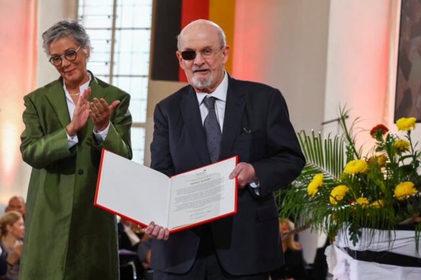 author salman rushdie calls for defense of freedom of expression as he receives german prize