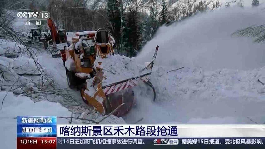 excavator clearing road