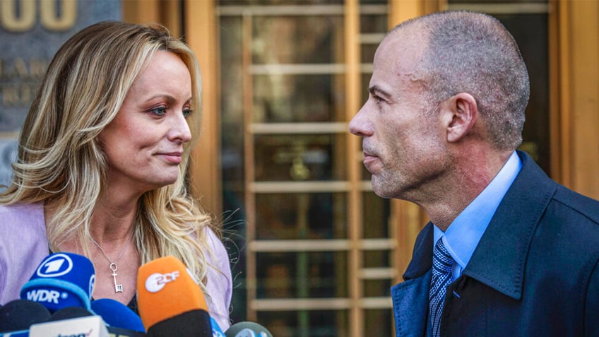 Stormy Daniels and Michael Avenatti during a news conference.