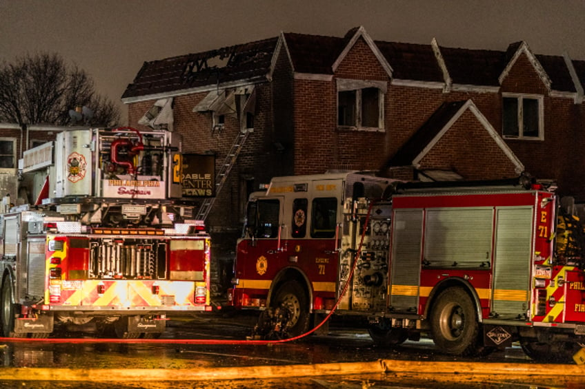 A home near the crash site sustained extensive fire damage. (Photo by Thomas Hengge/Anadolu via Getty Images)