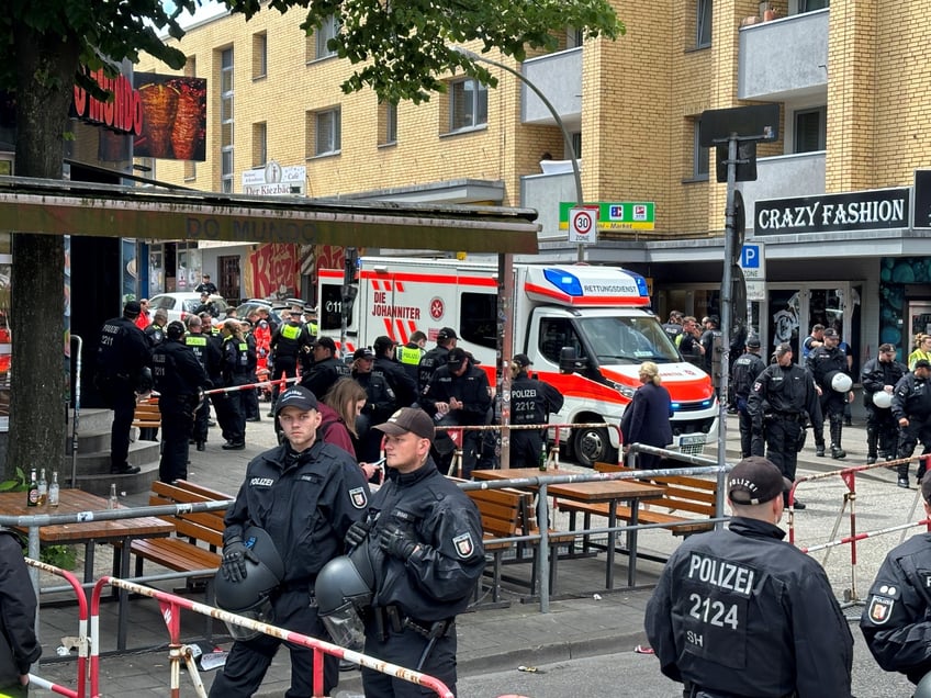 16 June 2024, Hamburg: Police cordon off an area near the Reeperbahn after an operation. Police have shot a man armed with a pickaxe and a Molotov cocktail near the Reeperbahn in Hamburg-St. Pauli. He was hit in the leg, a police spokesman said on Sunday in response to a report in the newspaper "Bild". Photo: Steven Hutchings/dpa (Photo by Steven Hutchings/picture alliance via Getty Images)