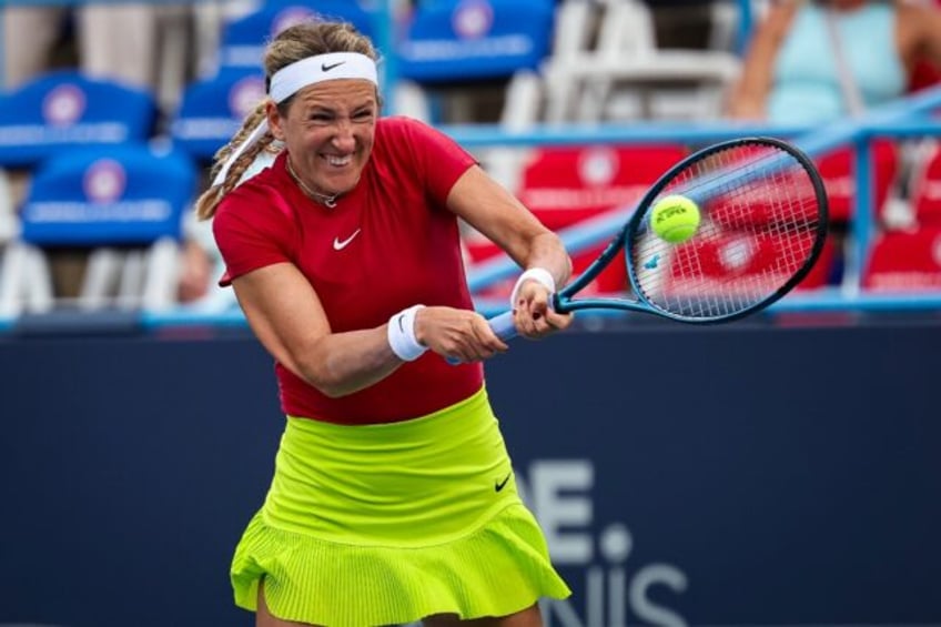 Victoria Azarenka returns a shot during her victory over American Hailey Baptiste at the W