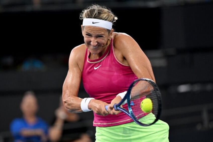 Belarus's Victoria Azarenka hits a return against Russia's Anna Kalinskaya at the Brisbane International