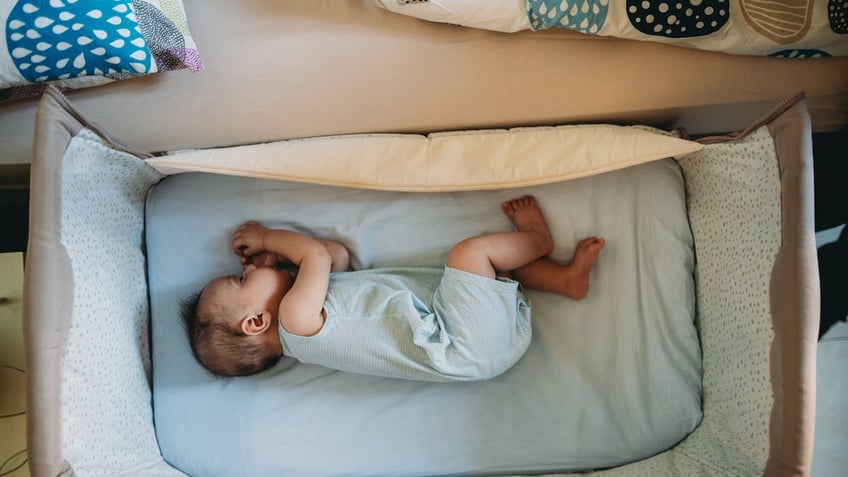 Baby in crib