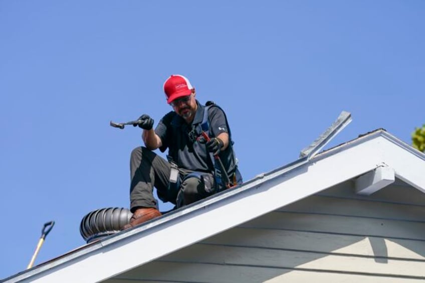 back at old job anthony mackie lends star power to new orleans post ida roof repair effort