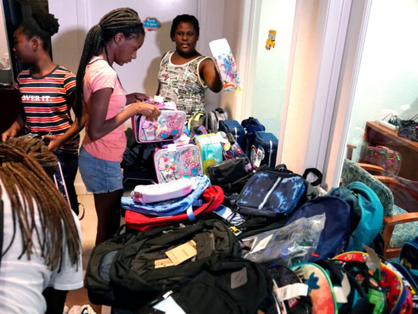 back to school giveaway alabama church donates backpacks supplies