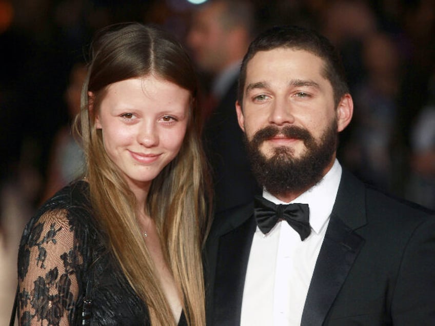 LONDON, UNITED KINGDOM - OCTOBER 19: Shia LeBeouf and Mia Goth attend the 'Fury' Closing Night Gala at Odeon Leicester Square on October 19, 2014 in London, England. (Photo by Fred Duval/FilmMagic)