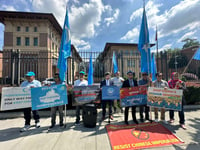‘Backstabbers’: Uyghurs Protest Turkish Foreign Minister’s Friendly Trip to Chinese Genocide Ground Zero