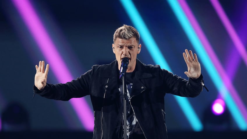 backstreet boys nick carter accused of sexually assaulting woman when she was 15 on yacht in 2003 lawsuit