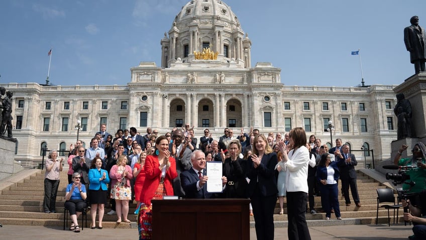 Along with DFL legislative leaders and his commissioners, Minnesota Gov. Tim Walz threw a ceremonial budget bill-signing party in 2023 on the State Capitol steps. Walz stood in front of hundreds of supporters to boast about the accomplishments in the nearly $72 billion budget made possible by the Democrats (DFL) control of the state legislature and governor's office.