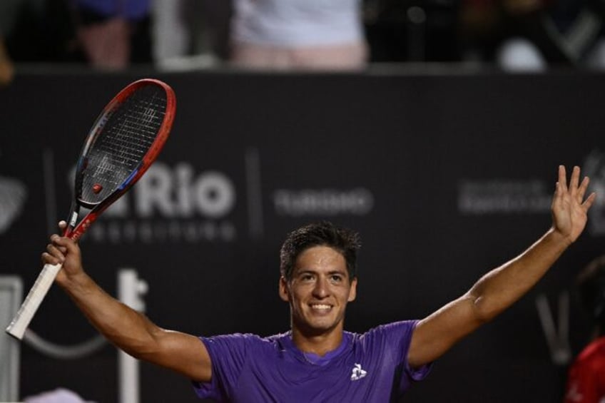 Champion: Argentina's Sebastian Baez celebrates his victory against Mariano Navone