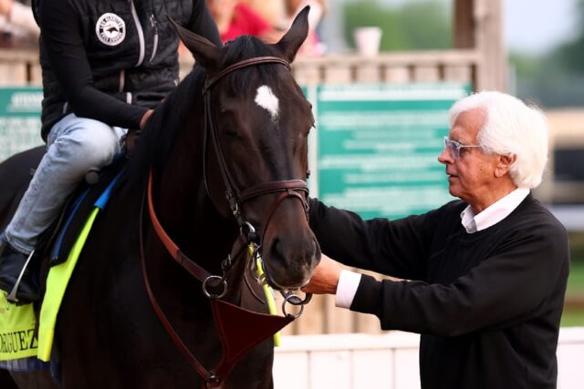 Trainer Bob Baffert stands with Rodriguez, one of his two entries in the 151st Kentucky De