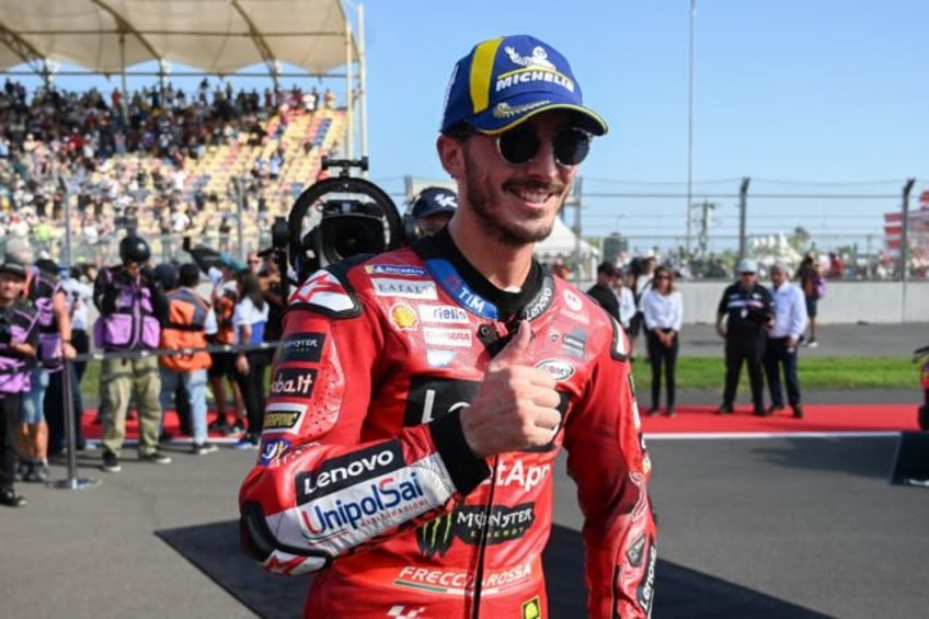 Francesco Bagnaia celebrates his sprint victory in Indonesia