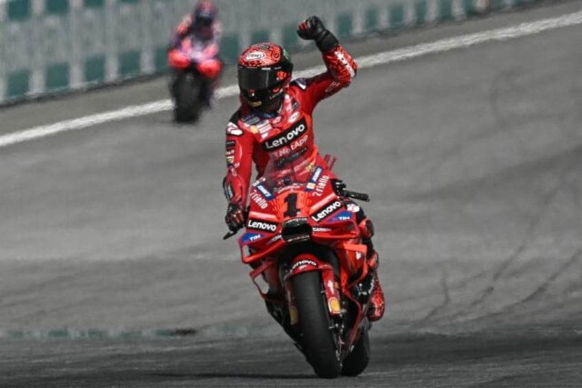 Francesco Bagnaia celebrates his victory at MotoGP Malaysia