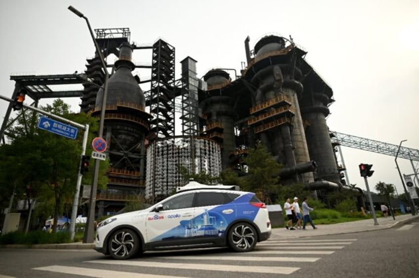 Driverless taxis, like this Apollo Robotaxi car, are already on the roads with limited cap