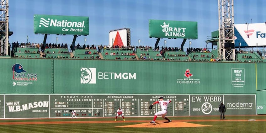 ball gets stuck in light of fenway parks green monster scoreboard