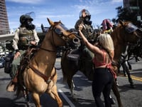 Balloons, bubbles, tear gas: LA anti-Trump protests turn chaotic
