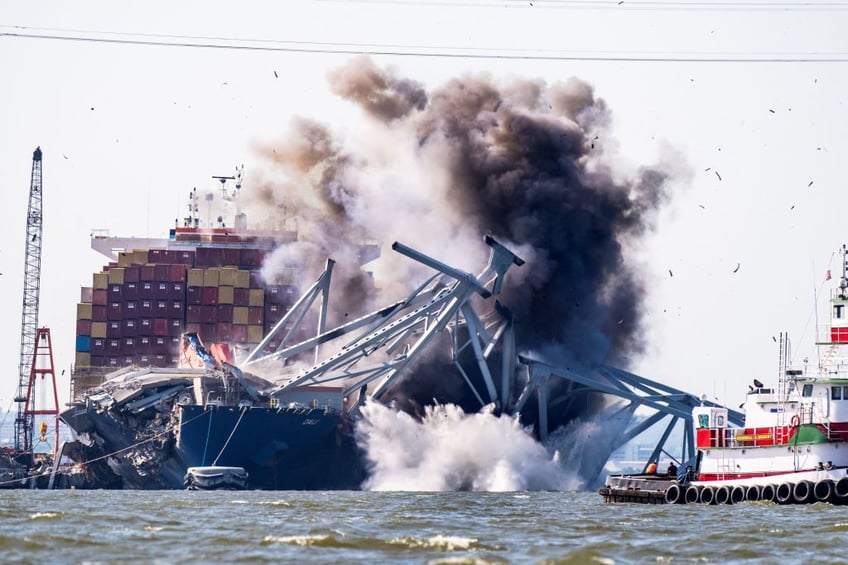 baltimore bridge span blown up as effort to clear main shipping channel continues