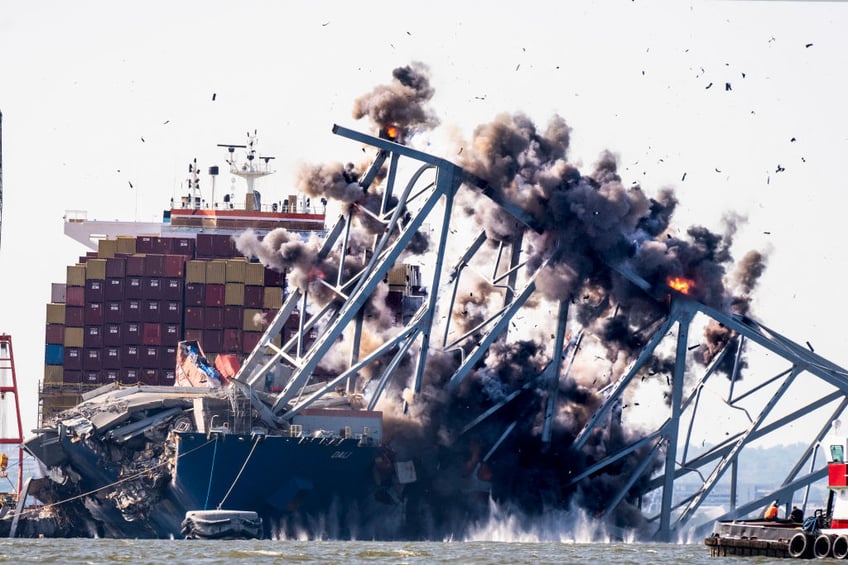 baltimore bridge span blown up as effort to clear main shipping channel continues