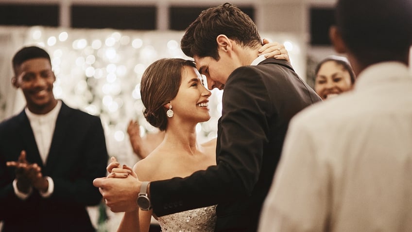 bride and groom dancing