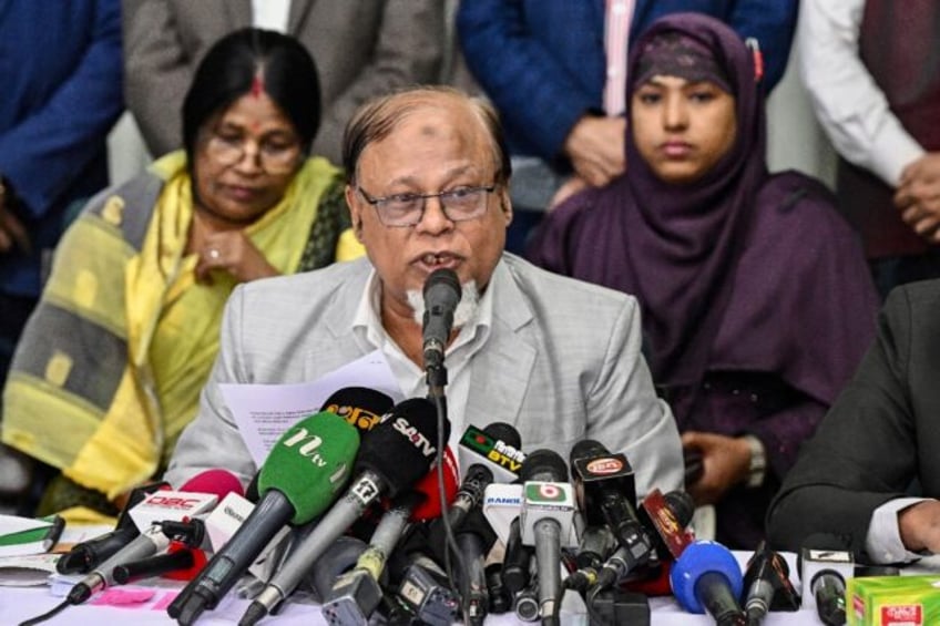 A.K.M Saiful Majid, chairman of the Grameen Bank, speaks during a news conference to confi