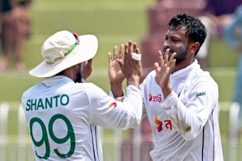 Bangladesh's Shakib Al Hasan (right) and captain Najmul Hossain Shanto during the historic